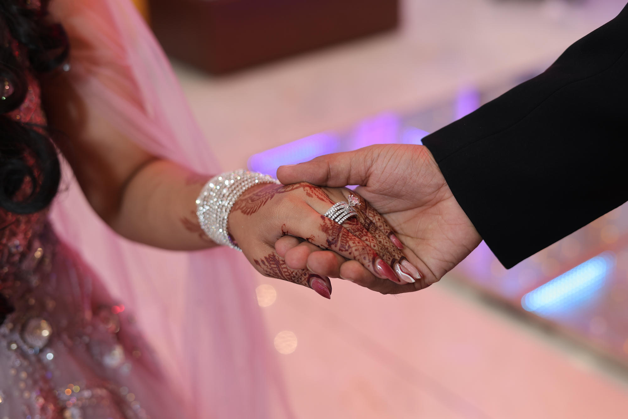 Akansha and Shivendra holding hands